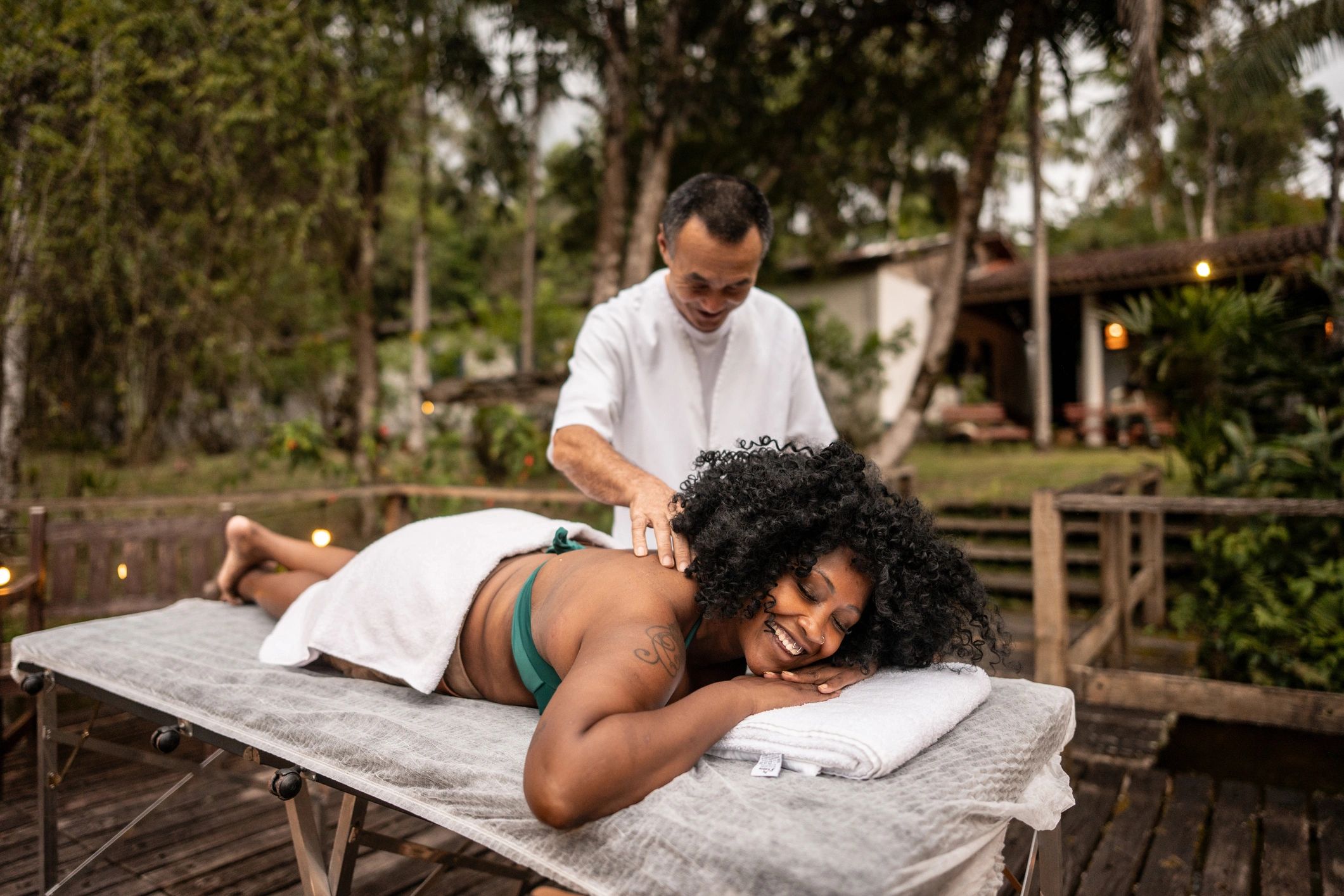 Massage therapy session in a calm treatment room